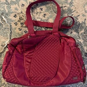 Lug Cranberry/Maroon Bag with Organized pocket. Fitness/yoga/overnight Like new.